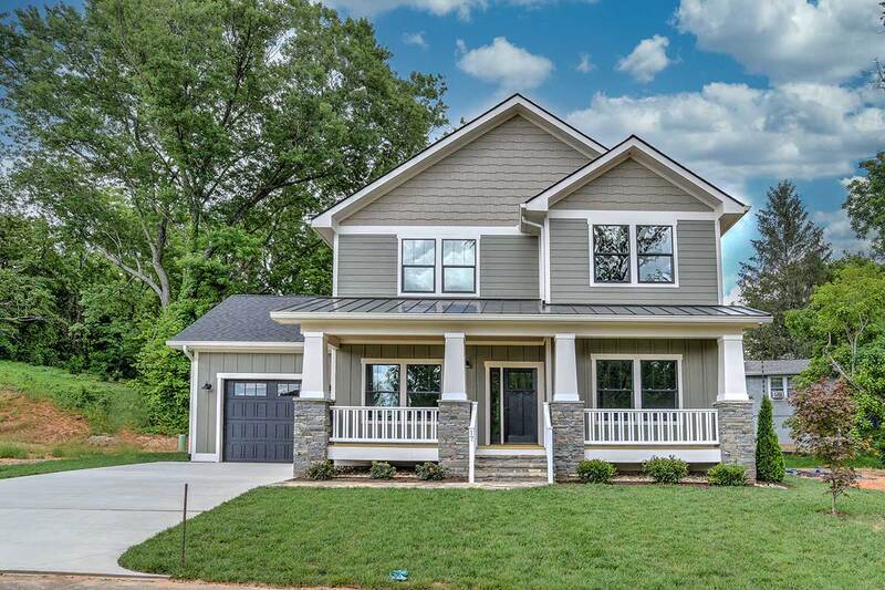 Custom home exterior by Wanoca Builders in Asheville, NC - photo 1