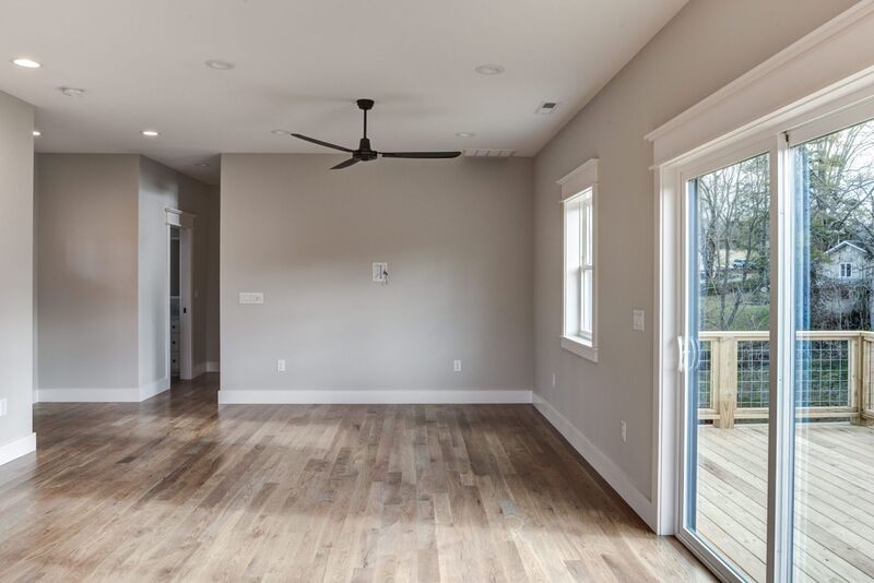 Custom interior living space by Wanoca Builders - photo 1
