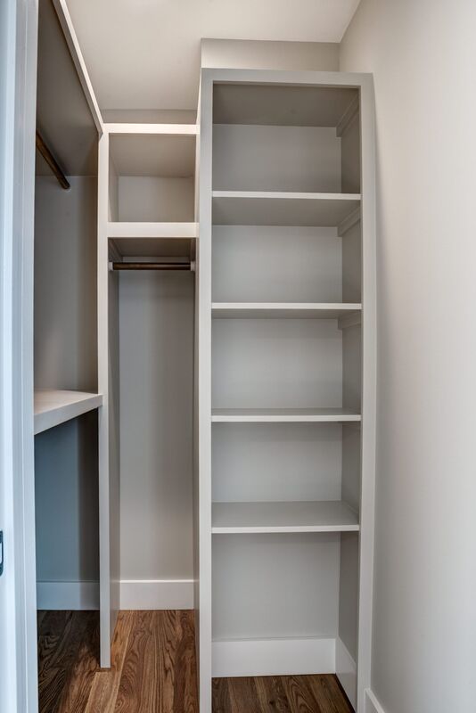 Custom closet and built-in cabinetry by Wanoca Builders - photo 1